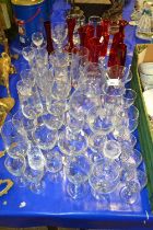 Large Mixed Lot: Various assorted drinking glasses, ruby glass vases etc