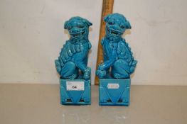A pair of turquoise glazed Chinese foo dogs