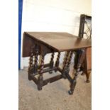 Small oak drop leaf table on barley twist legs