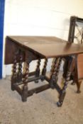 Small oak drop leaf table on barley twist legs