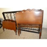 Pair of early 20th Century single bed frames with sprung centres