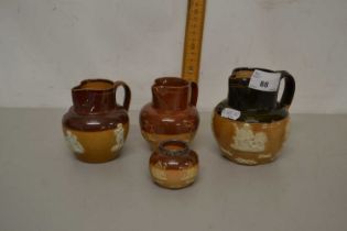 Group of Royal Doulton stone ware jugs and a similar condiment pot
