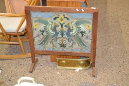 Early 20th Century oak framed fire screen set with a needlework panel depicting two birds