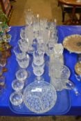 Two trays of various drinking glasses, glass bowls, decanter etc
