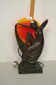 An Art Deco style bronzed resin figural table lamp