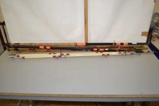 Collection of various assorted vintage fishing rods