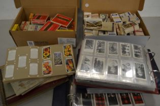 Mixed Lot: Various albums of cigarette cards, a box of assorted tea and cigarette cards and a