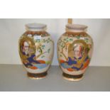 A pair of early 20th Century Japanese crackle glazed satsuma vases, one with significant body