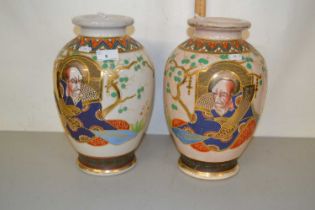 A pair of early 20th Century Japanese crackle glazed satsuma vases, one with significant body