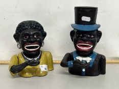A pair of novelty money boxes