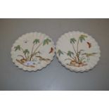 Group of four Copeland frilled rim side plates decorated with palm trees