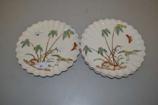 Group of four Copeland frilled rim side plates decorated with palm trees