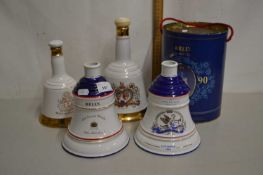 Group of five Wade Scotch Whisky bells (2 empty)