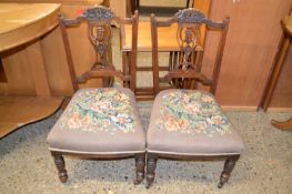 A pair of late Victorian tapestry covered bedroom chairs