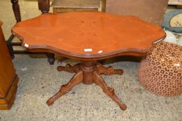 A modern inlaid pedestal coffee table