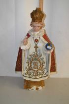 A plaster figure of a Bishop