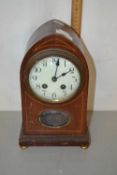 An Edwardian mantel clock in lancet shaped case