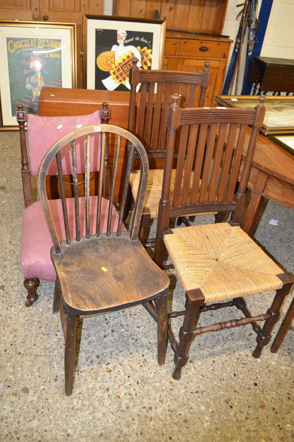 A pair of sisal covered dining chairs together with a further stick back chair and a pink