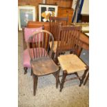 A pair of sisal covered dining chairs together with a further stick back chair and a pink