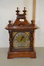 Late 19th Century continental mantel clock with brass movement striking on a coiled gong set in an