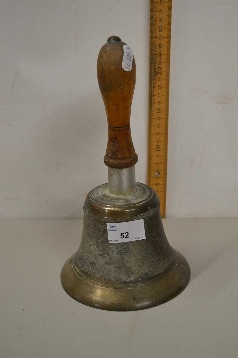 Brass and wood handled hand bell