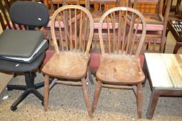Pair of elm seated stick back chairs