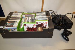 An Xbox 360 together with a quantity of assorted games