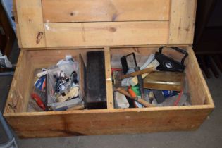 A low wooden storage box and assorted household contents, tools etc