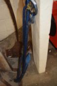 A blue painted iron anchor