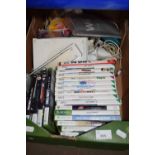 Box containing a Nintendo Wii, with various games and accessories