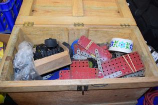 Wooden box containing a quantity of Meccano