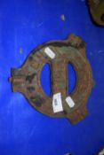 An iron implement plate marked The Ogle Roller, made by Derby Cast Well Foundry
