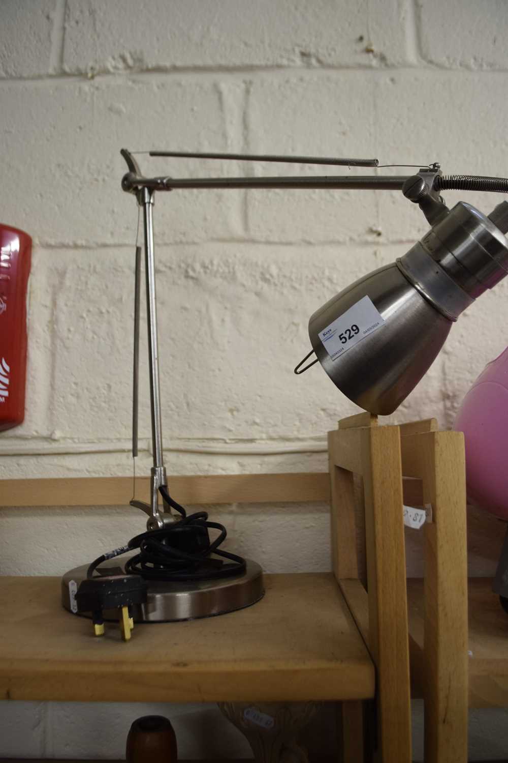 An anglepoise lamp