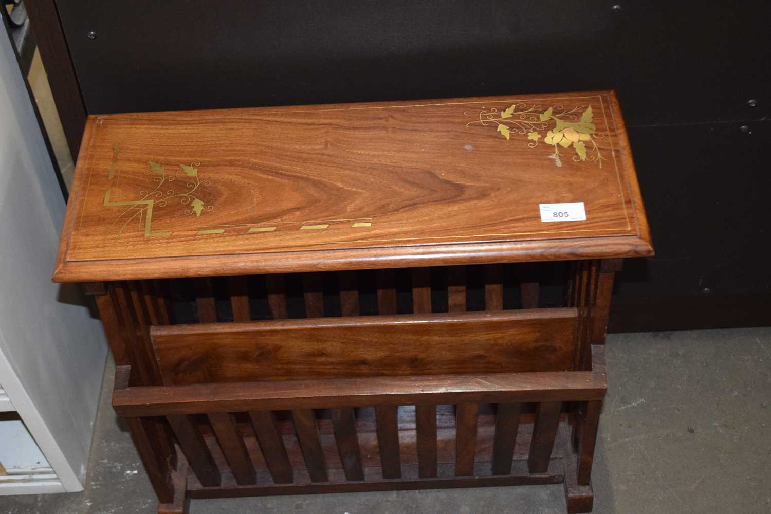 A brass inlaid side table/magazine rack