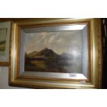 Early 20th Century oil on canvas study of a fisherman by lochside, gilt framed
