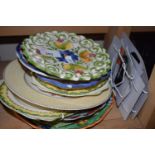 Quantity of assorted plates and wall hanging brackets