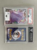 Two graded cased Pokemon cards