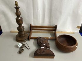 An oak table lamp together with a further book rack, circular bowl and a carved wood bust