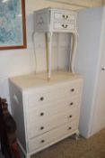 A French style cream painted four drawer bedroom chest and similar bedside cabinet