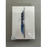 An iPad Mini, boxed and sealed dated 2014