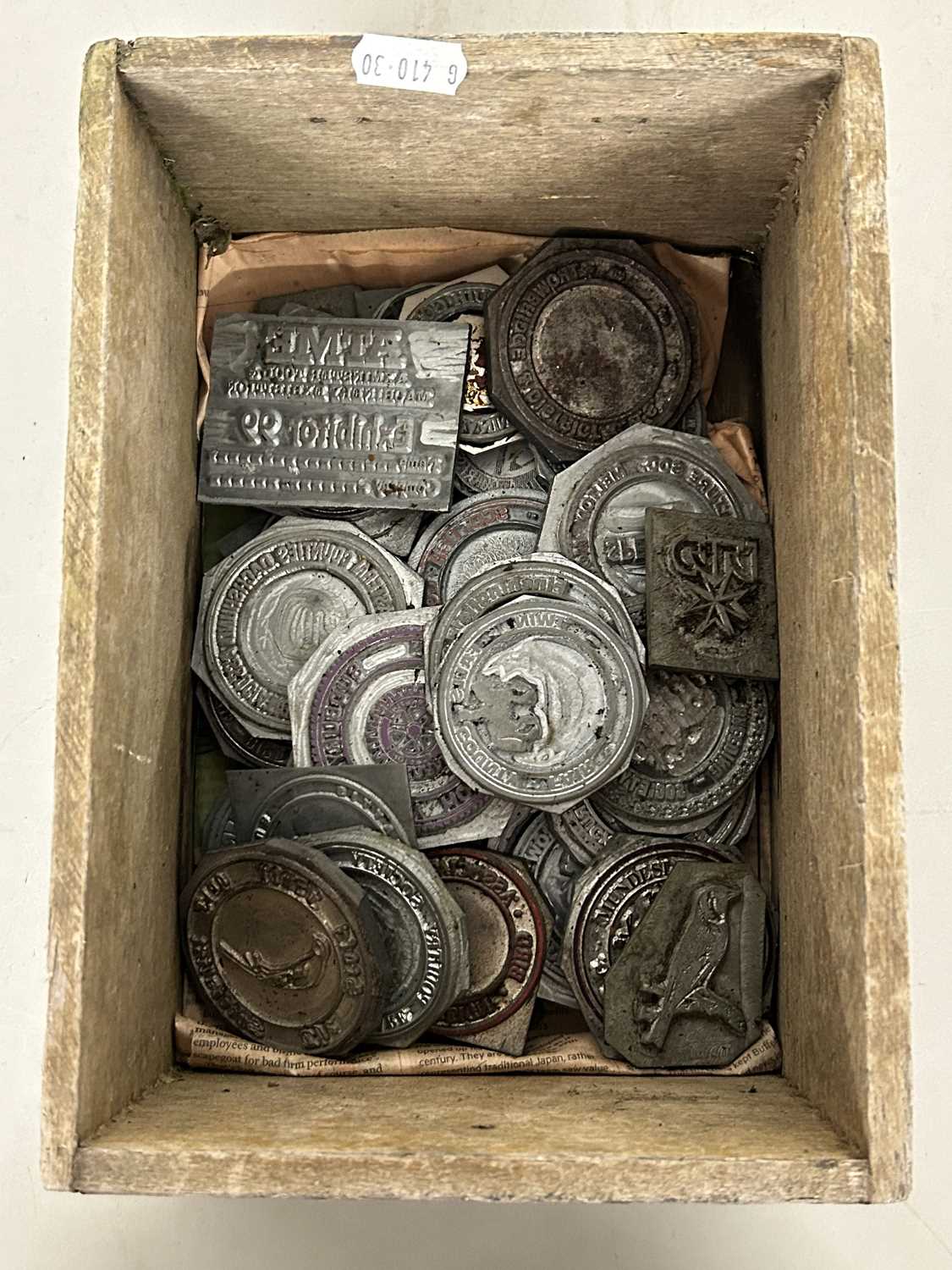 Box of various assorted small printing blocks