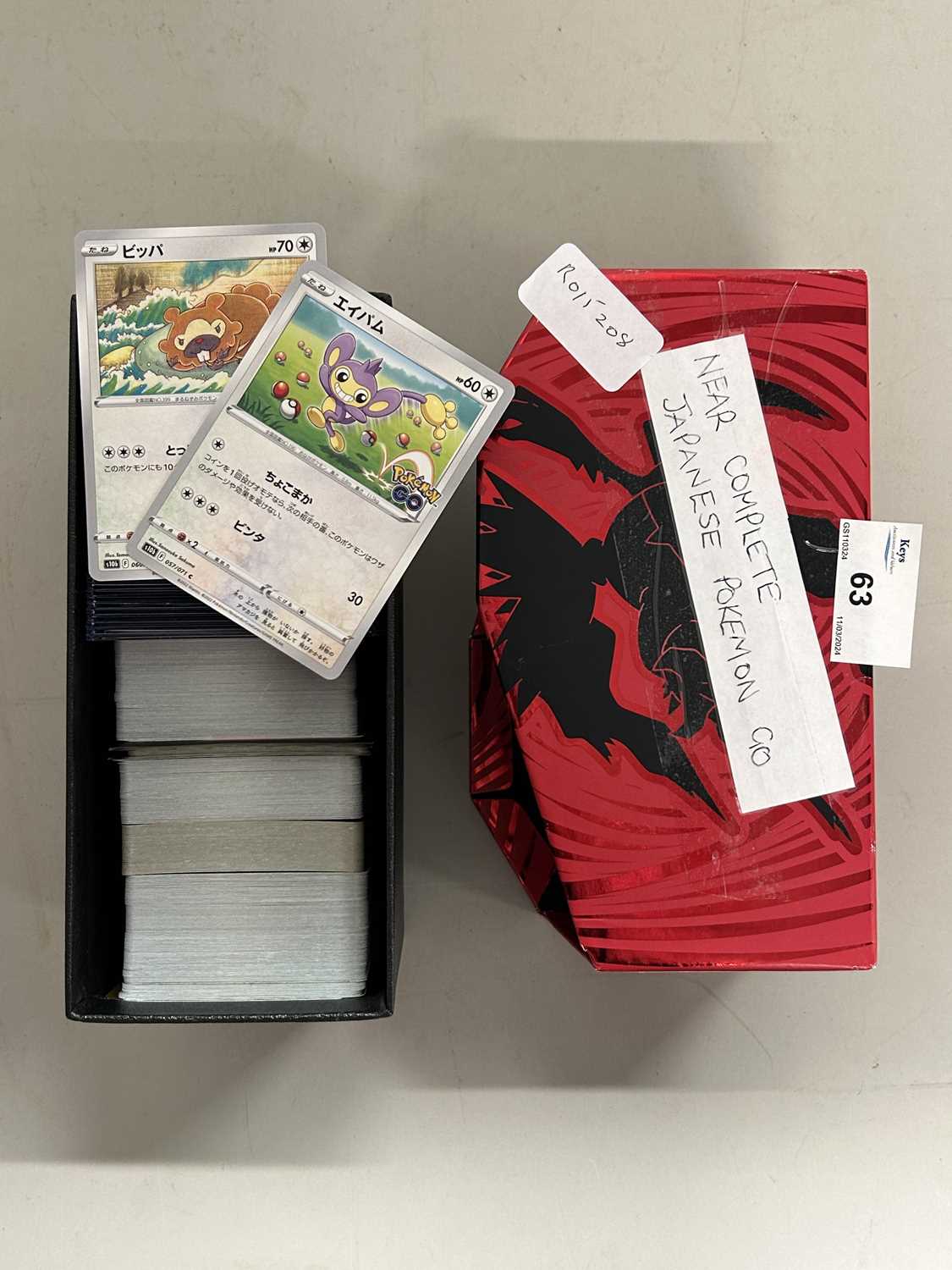 A box of Japanese Pokemon Go cards