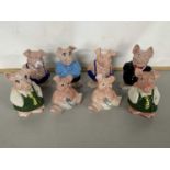 Eight various Wade Nat West piggy banks