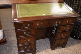 A twin pedestal mahogany veneered office desk, 91cm wide