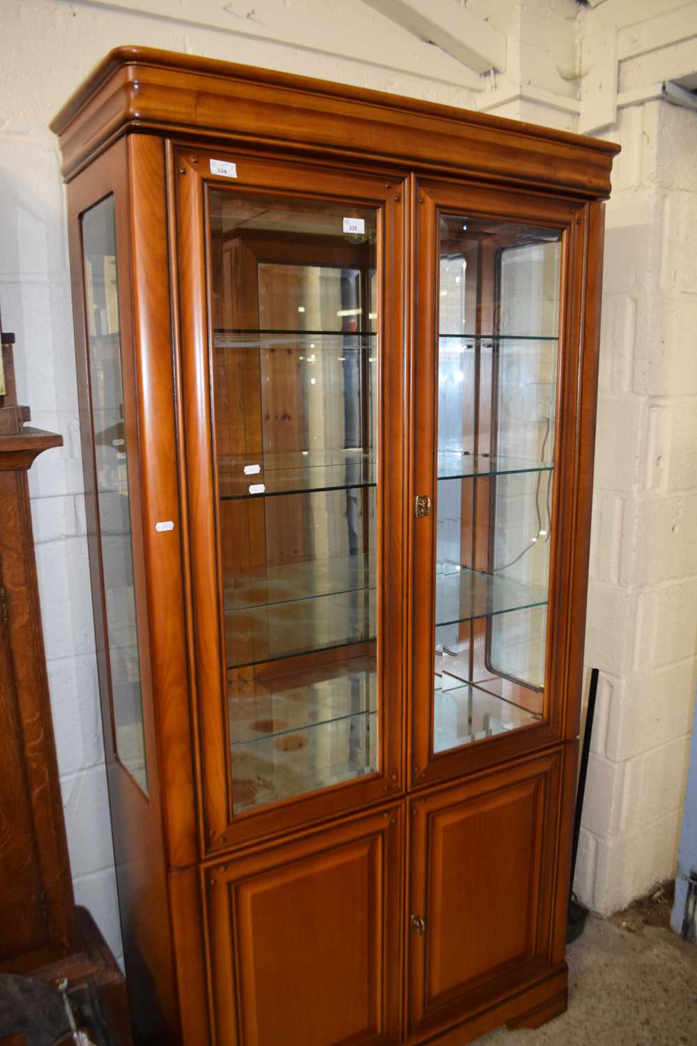 Modern lounge display cabinet with mirrored top section and cupboard base