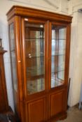 Modern lounge display cabinet with mirrored top section and cupboard base