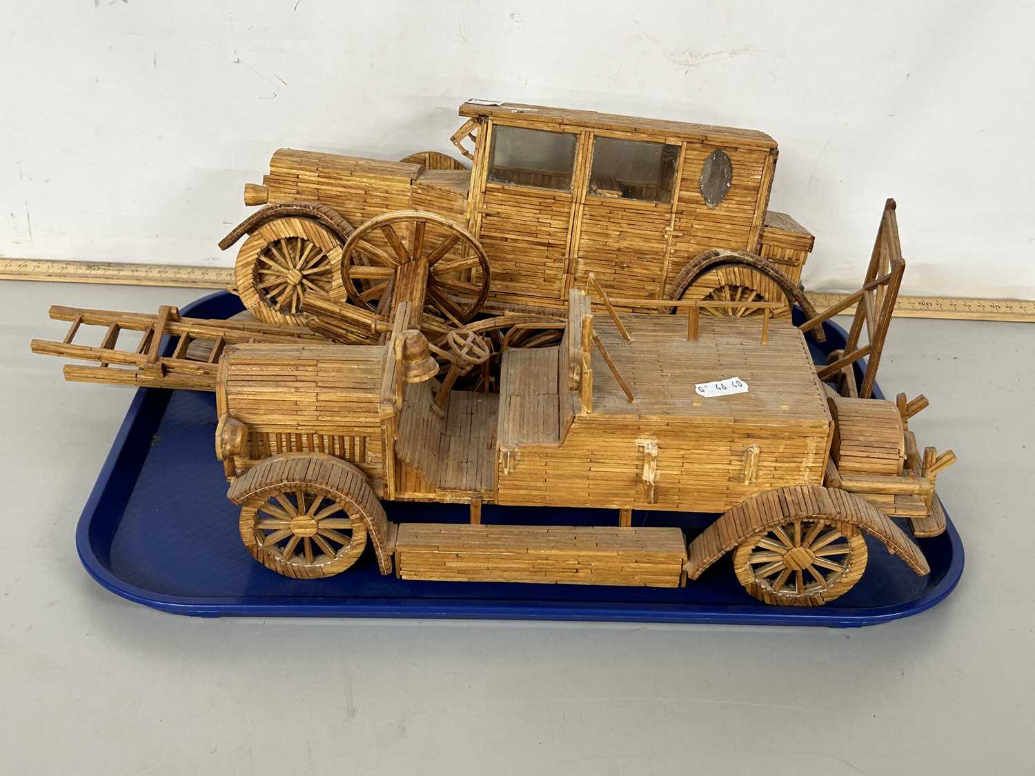 Two matchstick models of vintage cars and other related items