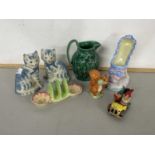 Pair of Rye pottery cats, a further Noddy car, Beatrix Potter Squirrel Nutkin figure and other