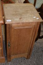 Late Victorian light oak single door bedside cabinet