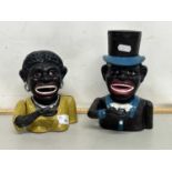 A pair of novelty money boxes